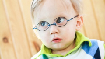 Toddler boy with glasses